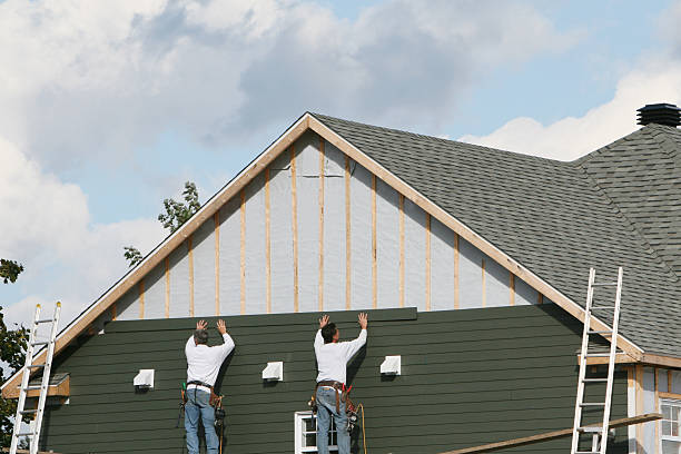 Professional Siding Contractor technician working in Huntsville, TX
